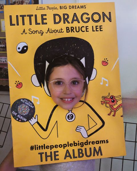 A child's face in a Little Dragon, A Song About Bruce Lee photo board