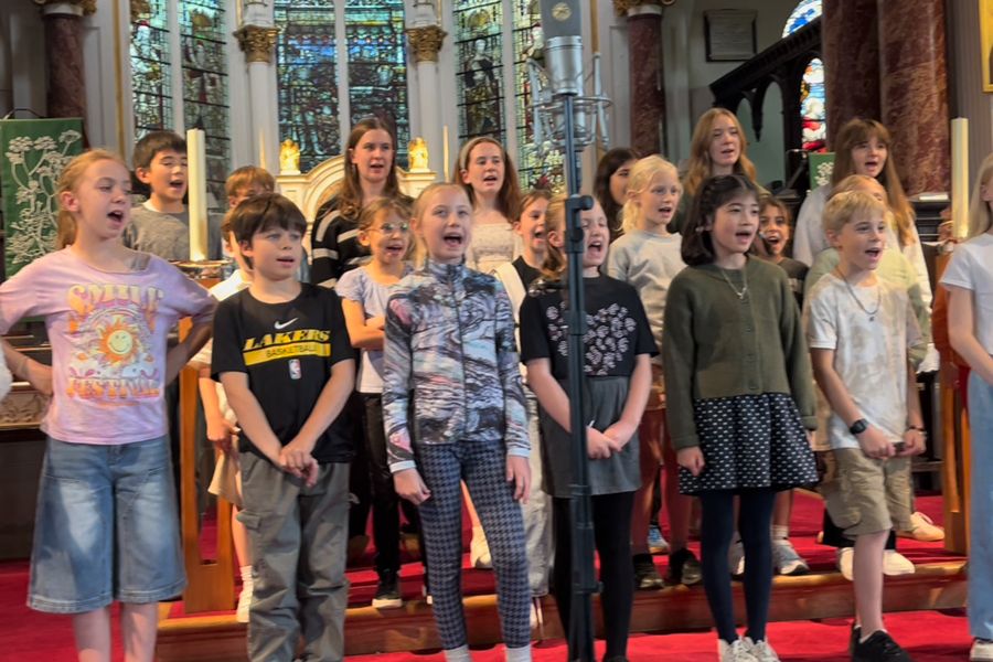 The children's chorus singing in a church